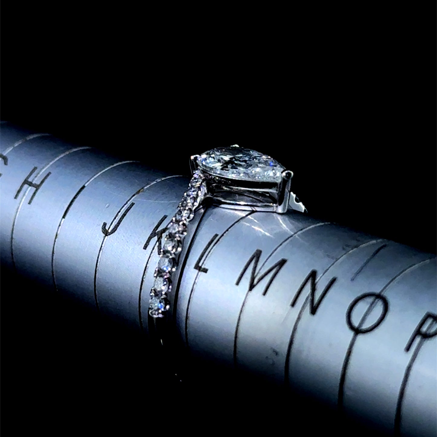 18K White Gold Pear Diamond Ring with Diamonds to Shoulders GIA E Colour