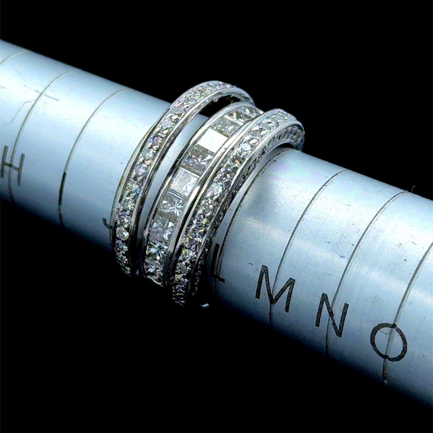 18K White Gold Triple Diamond Band Princess Diamonds To Centre Band