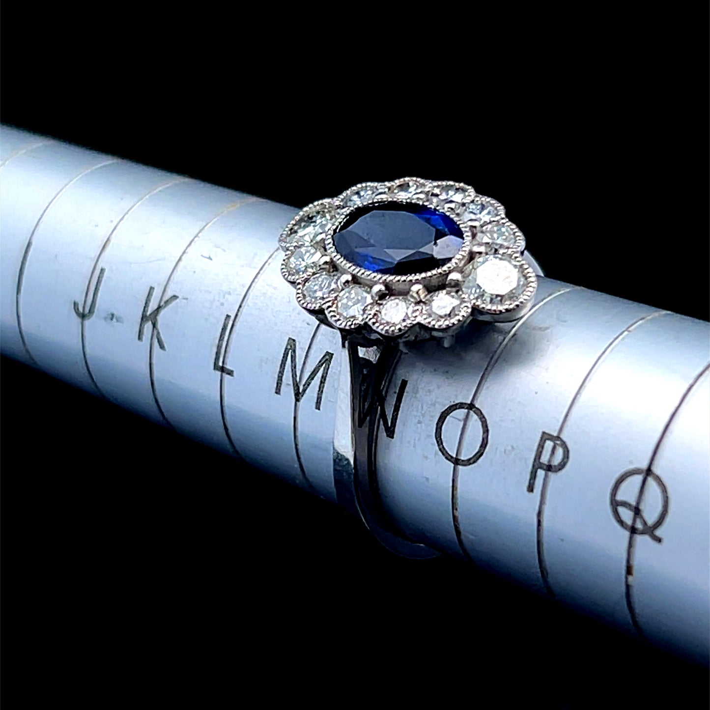 Platinum Sapphire & Diamond Marquise Shaped Halo Ring