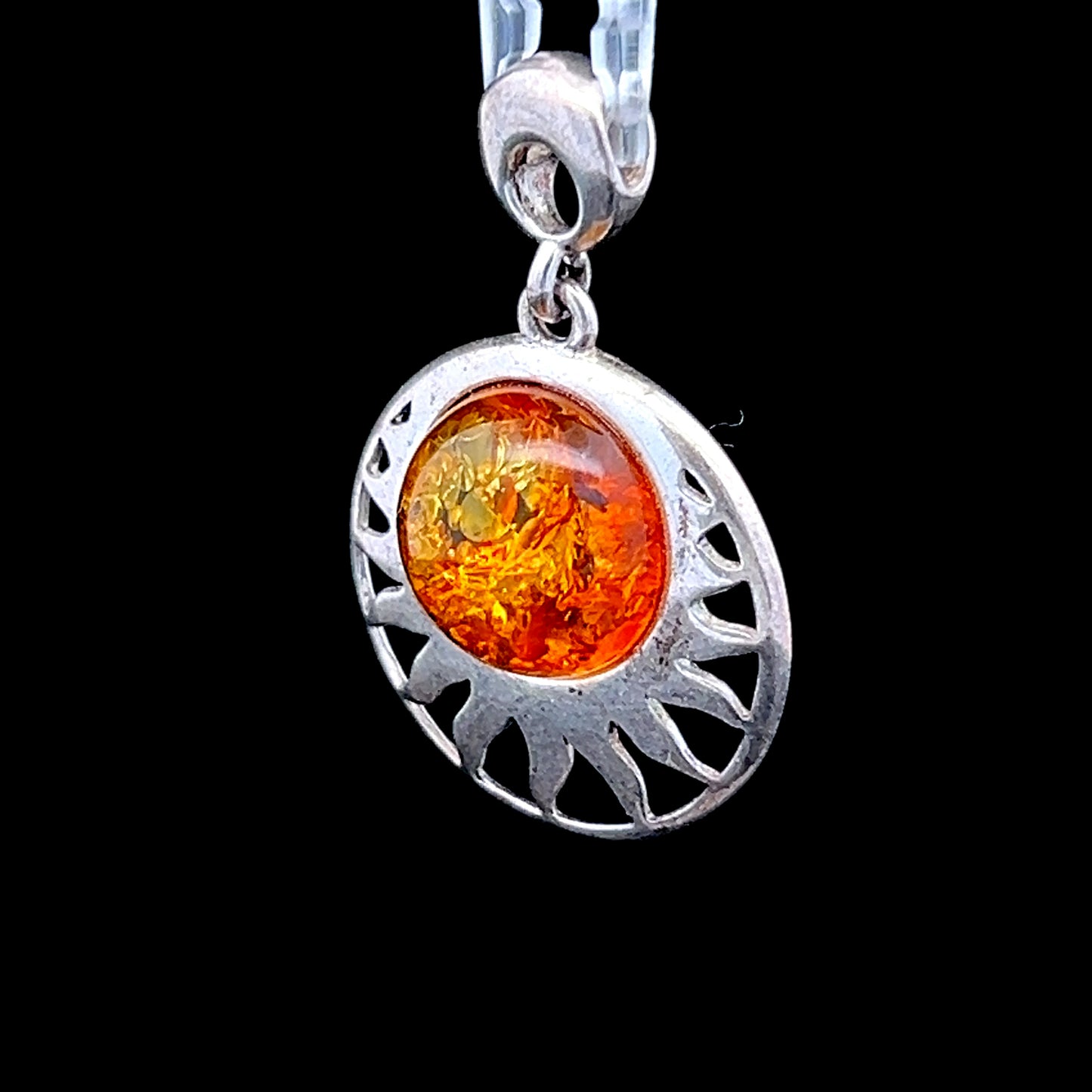 Silver Sun Amber Pendant