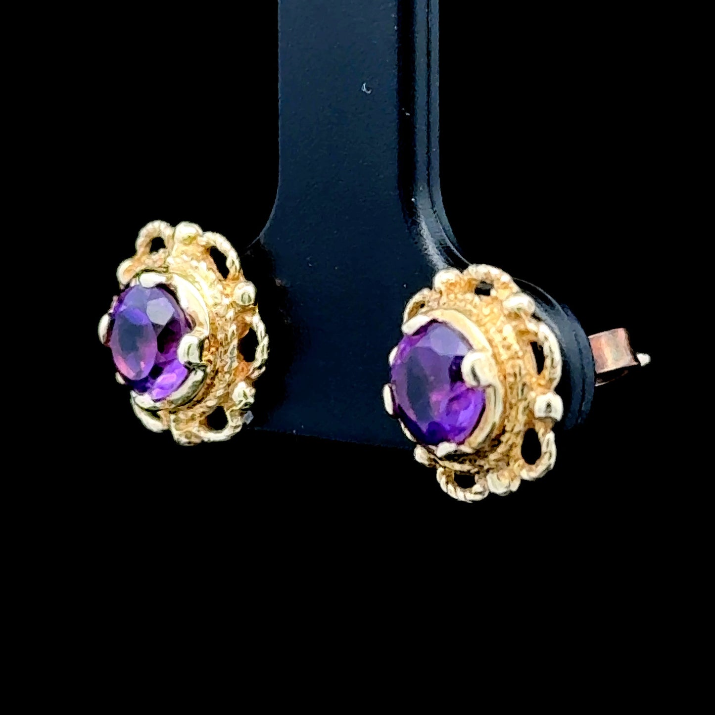 9k Yellow Gold Amethyst Studs in a Fancy Mount
