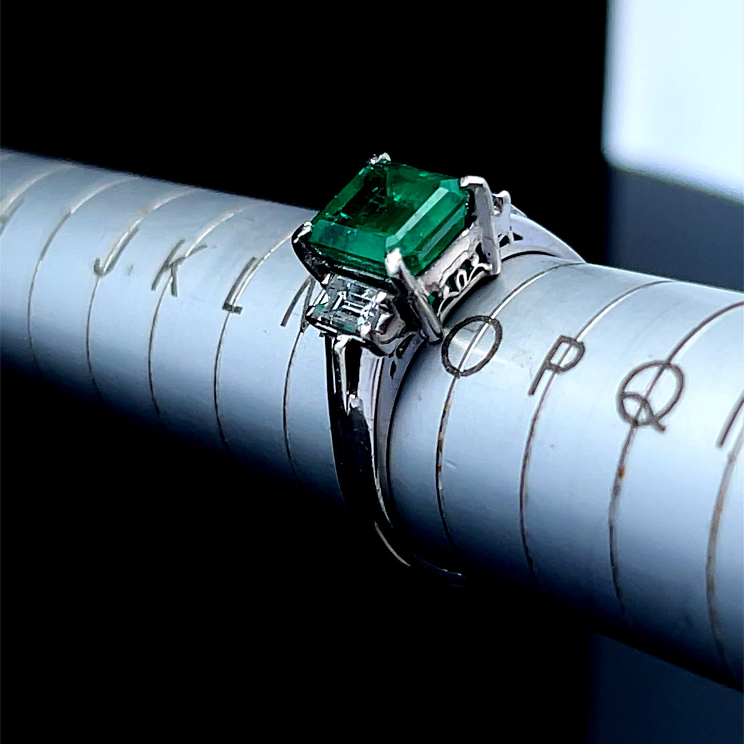 Platinum Emerald Ring with Baguette Diamonds APPX E: 1.75 CTS