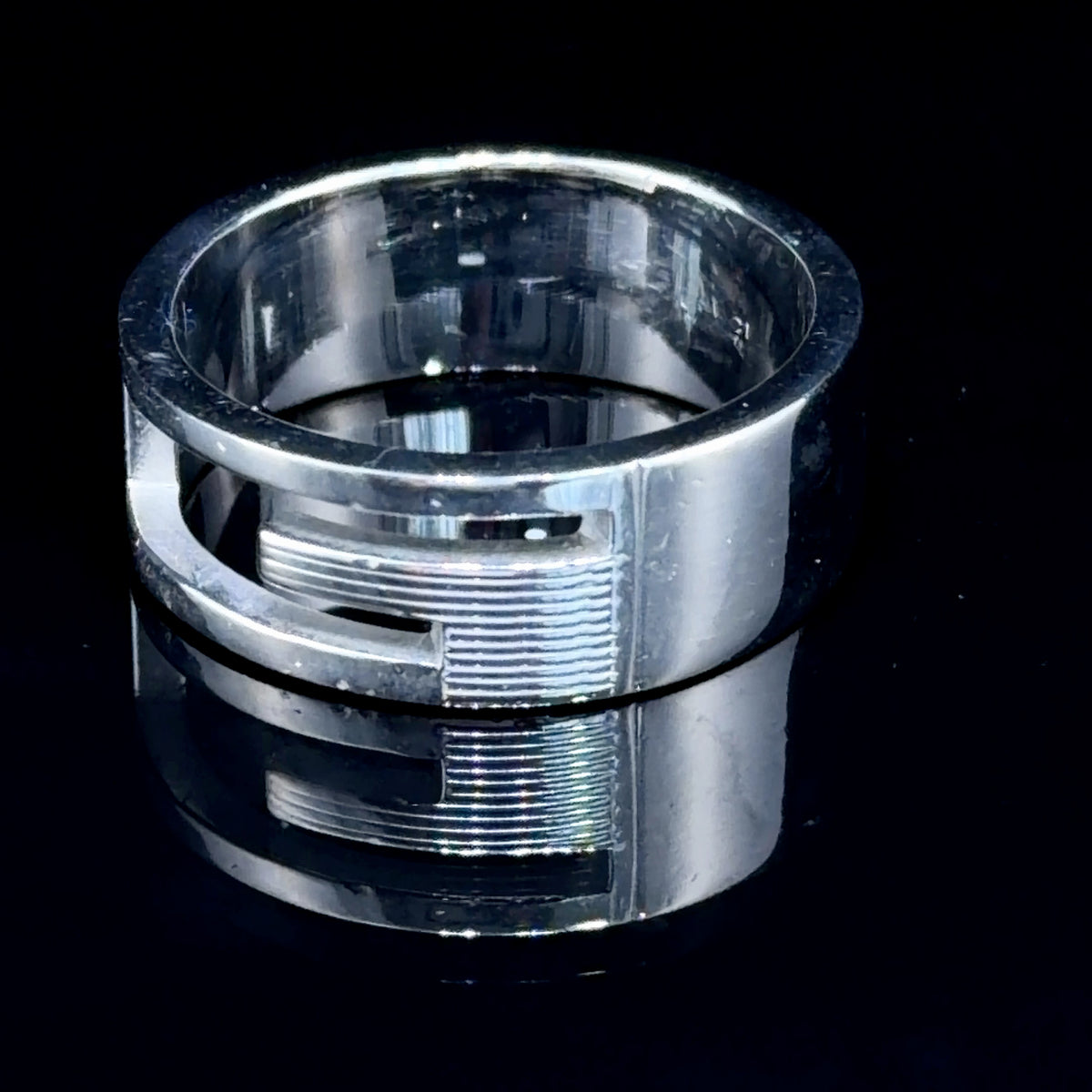 A Sterling Silver G Ring Featuring A Ribbed Finish By Gucci