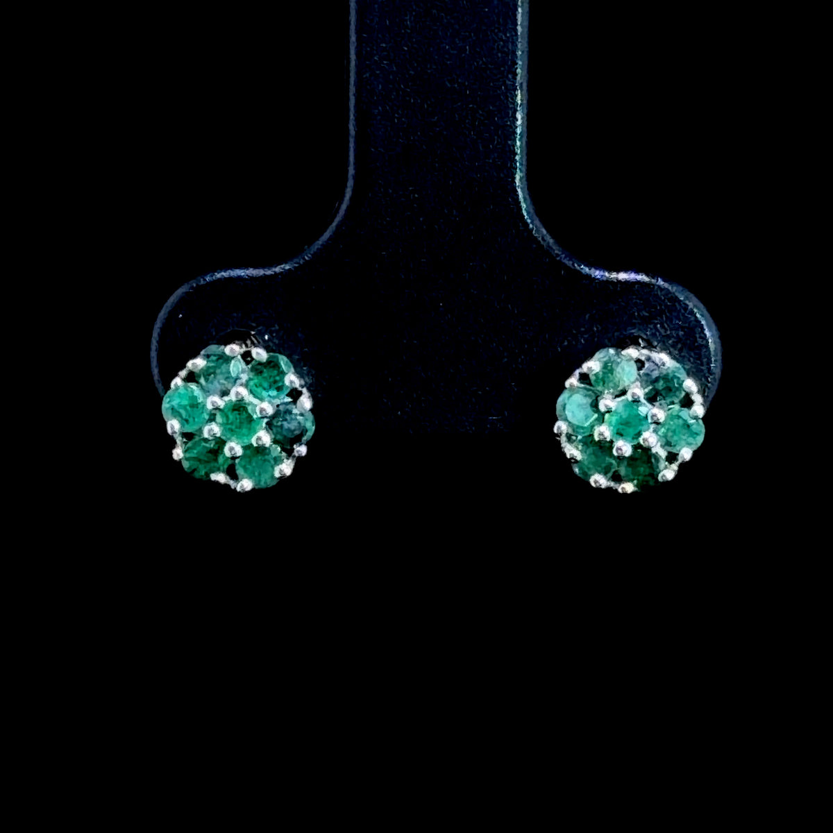 A Sweet Pair Of 9k White Gold Emerald Daisy Stud Earrings
