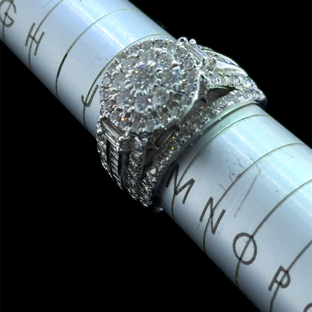 A Stunning Diamond Daisy Cluster Ring Featuring Round Brilliant And Baguette Cut Diamonds Appx 2.0 Cts Si1-2  J-K Colour