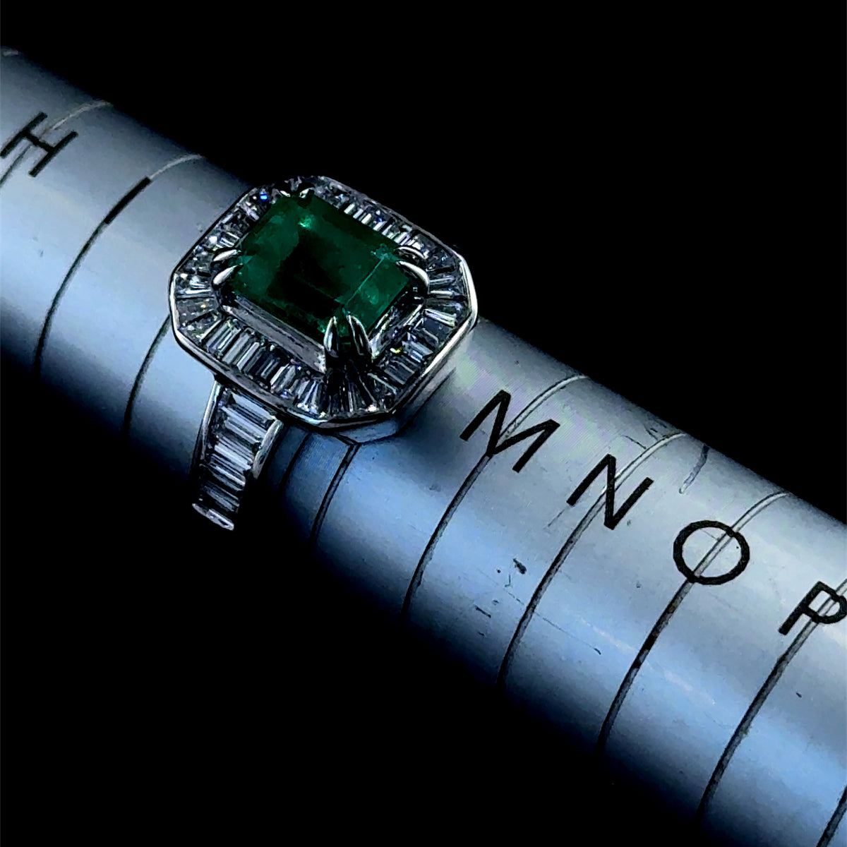 Platinum Emerald and Baguette Diamond Halo Ring With Diamonds to shoulders APPX: E-1.8CTS D-1CTS