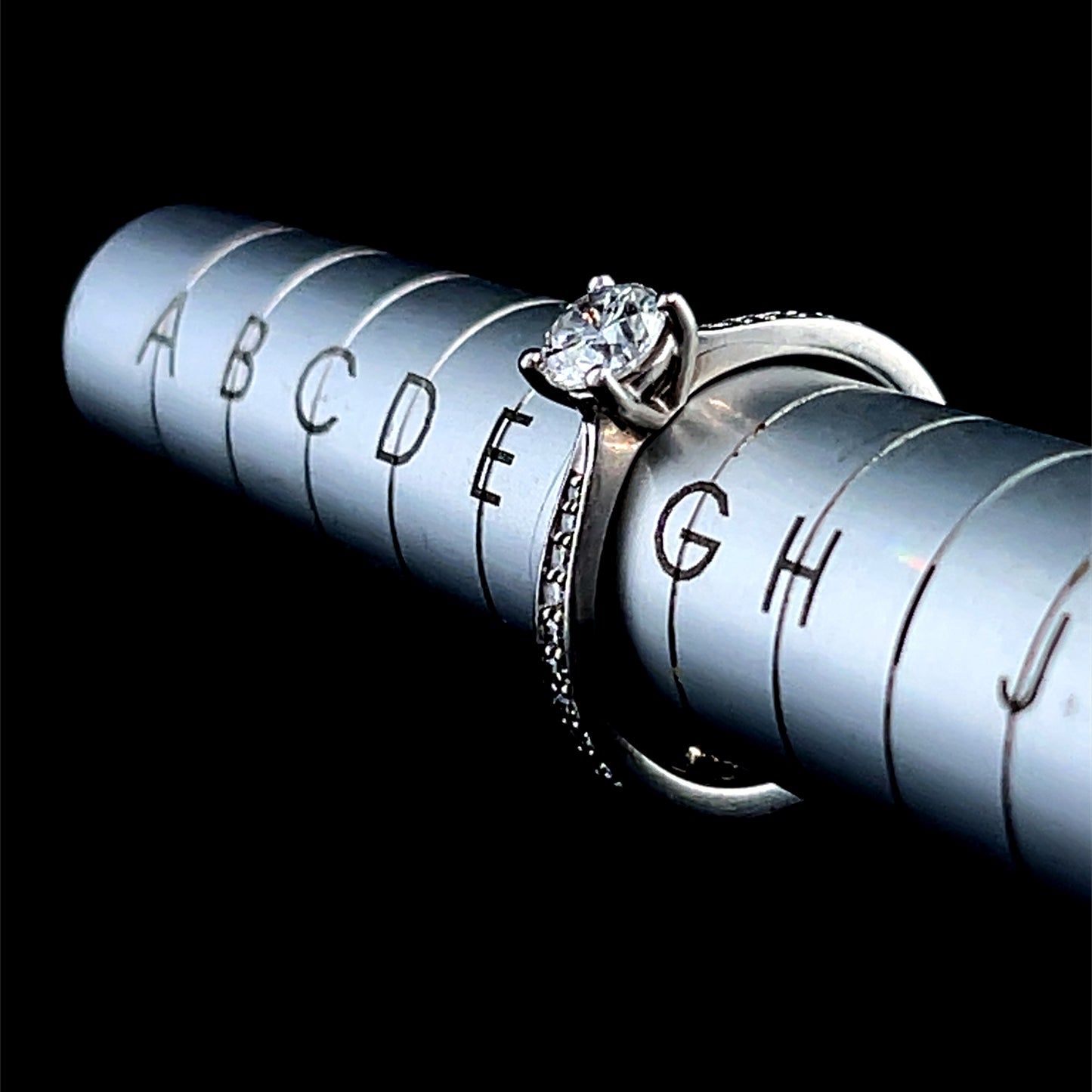 Platinum Solitaire Ring with Diamonds To Shoulders