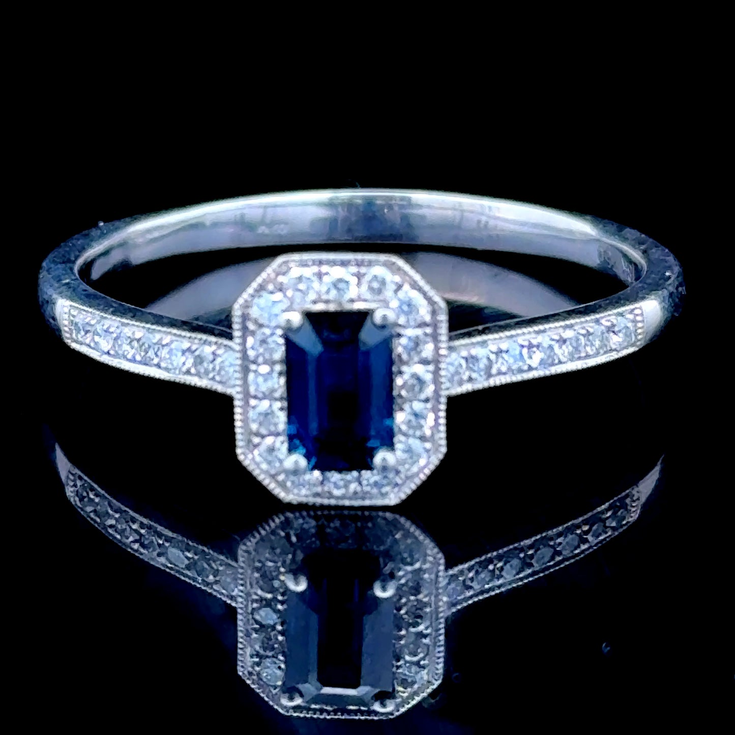 18K White Gold Sapphire & Diamond Halo Ring D:0.5 S:0.75