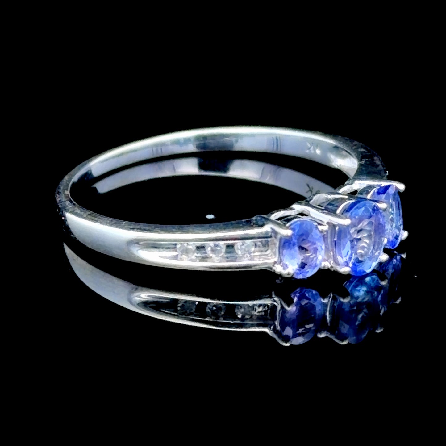 9K White Gold Tanzanite & Diamond Trilogy Ring