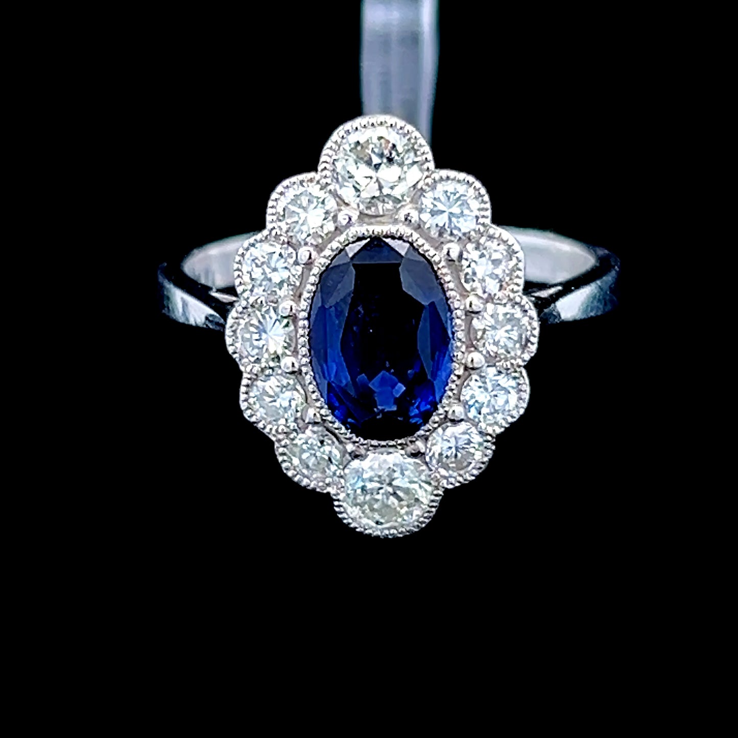 Platinum Sapphire & Diamond Marquise Shaped Halo Ring