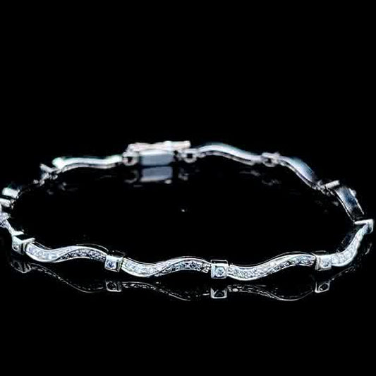 18K White Gold Twist Bracelet with Round Cut Diamonds Appx 1.25cts