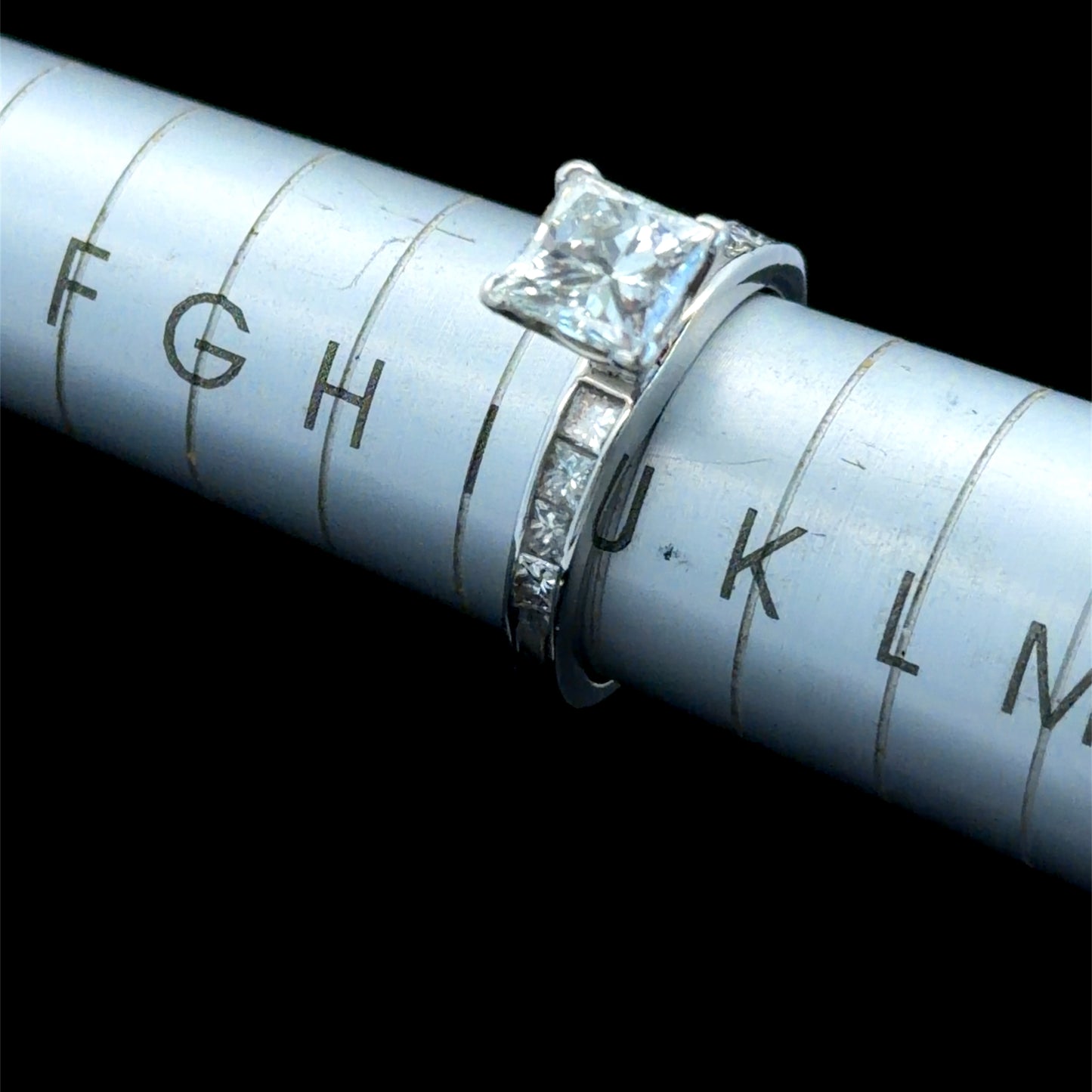 14K White Gold Princess Diamond Solitaire Ring With Diamonds To Shoulders APPX C: 1 CTS T: 1.5 CTS