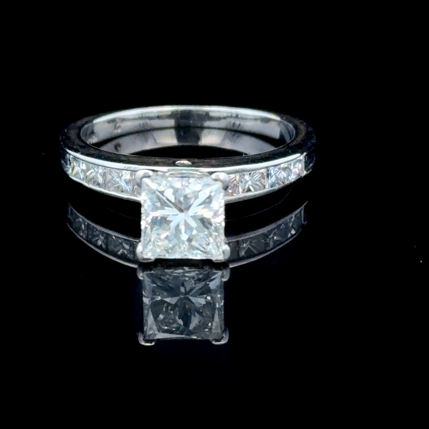 14K White Gold Princess Diamond Solitaire Ring With Diamonds To Shoulders APPX C: 1 CTS T: 1.5 CTS