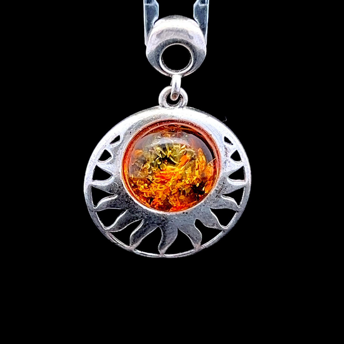 Silver Sun Amber Pendant