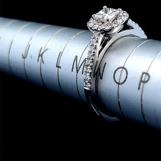 18K White Gold Princess Diamond Halo Ring APPX 0.7 CTS