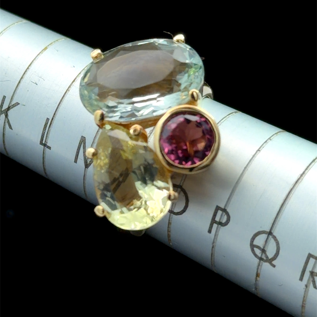 A Stunning 18k Yellow Gold Aquamarine Pink Tourmaline & Golden Beryl 3 Stone Ring