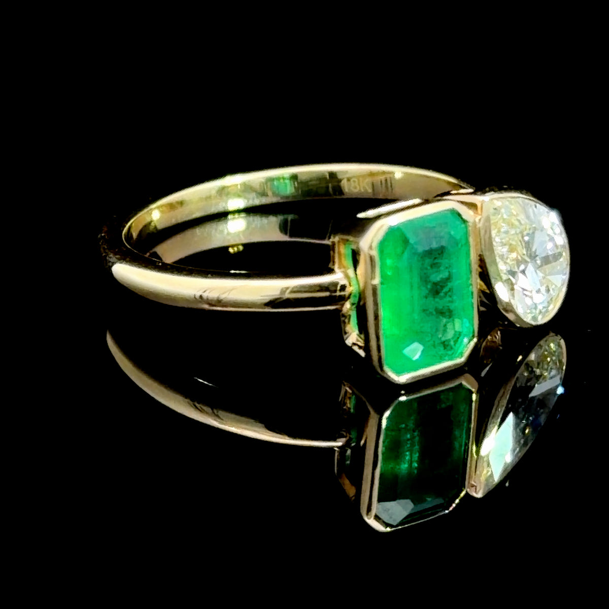 A Wonderful Moi Et Toi Pear Diamond of 0.9Cts & An Emerald Cut Emerald of 1.1 Ct Total 2 Cts