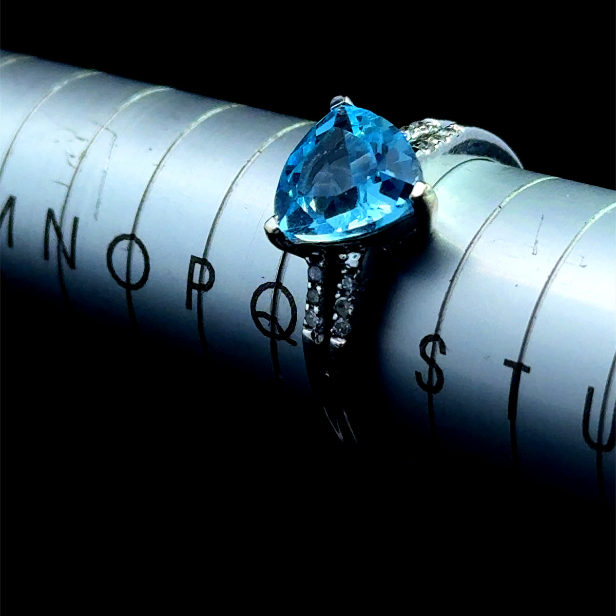 9K White Gold Trilliant Blue Topaz Ring with Diamonds to Shoulders