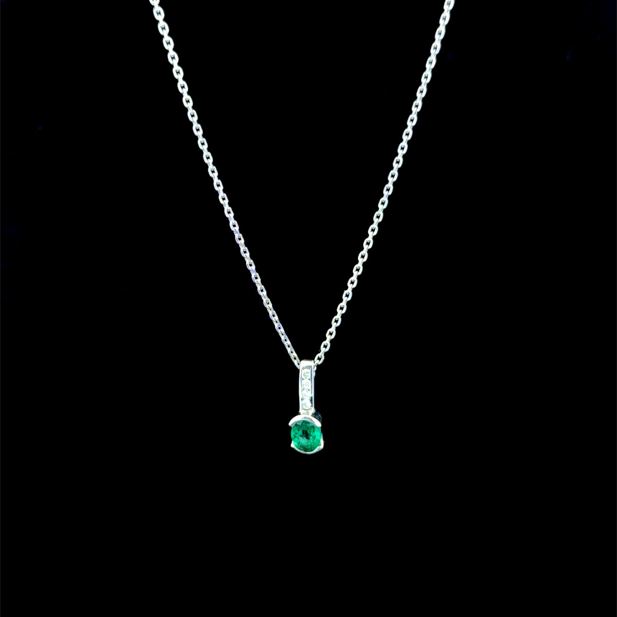 A Very Pretty Platinum Emerald & Diamond Pendant Suspended On A Platinum Chain 18 Inches Long Emerald Appx. 0.5 Cts