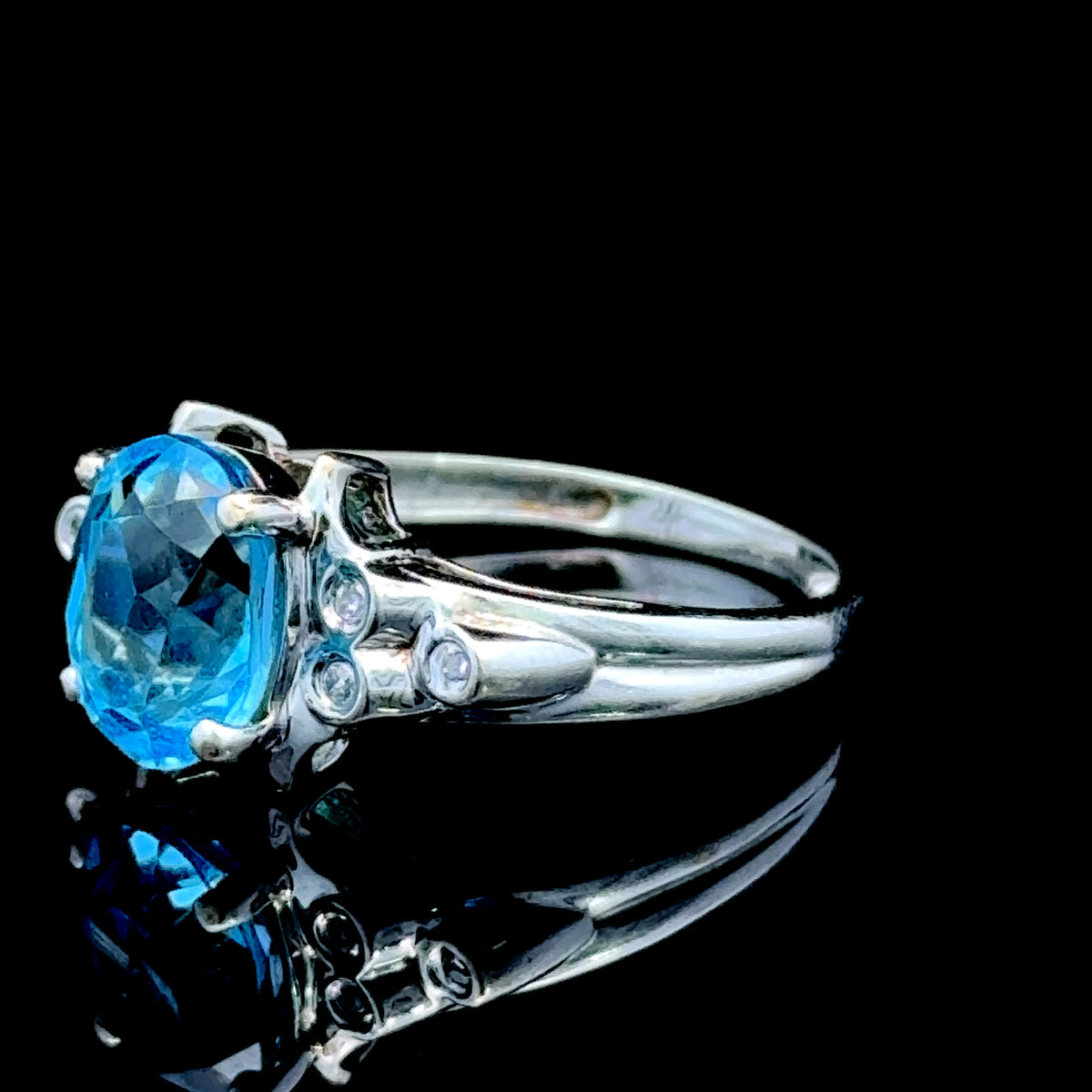 9K White Gold Blue Topaz & Diamond Ring