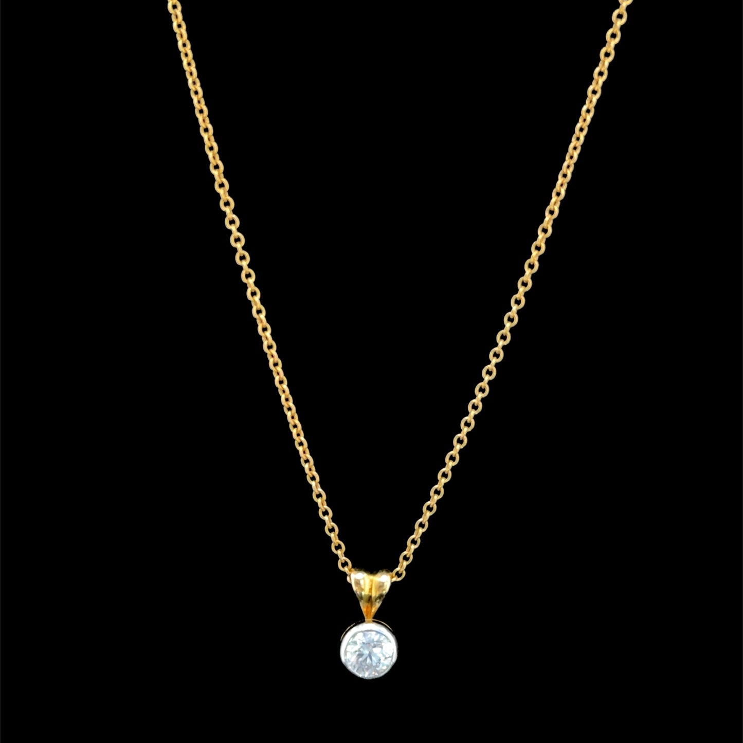 A Stunning 18k Bezel Set 0.6Ct Diamond Solitaire Pendant & Chain 18” Long