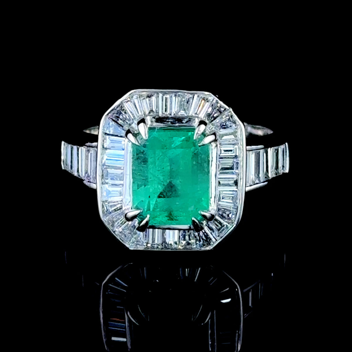 Platinum Emerald and Baguette Diamond Halo Ring With Diamonds to shoulders APPX: E-1.8CTS D-1CTS