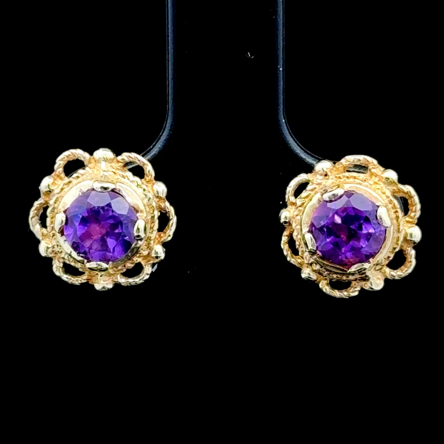 9k Yellow Gold Amethyst Studs in a Fancy Mount