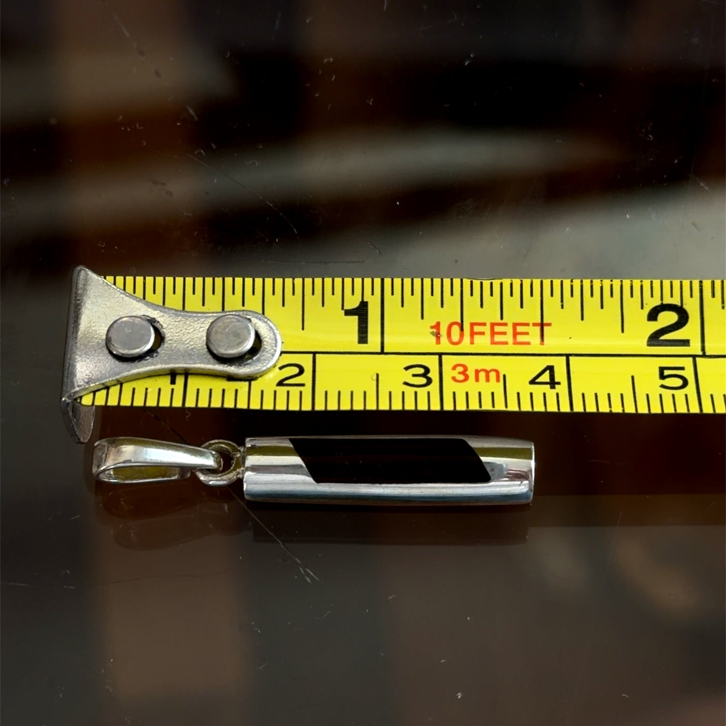 Modern Silver and Amber Cylindrical Pendant (only).