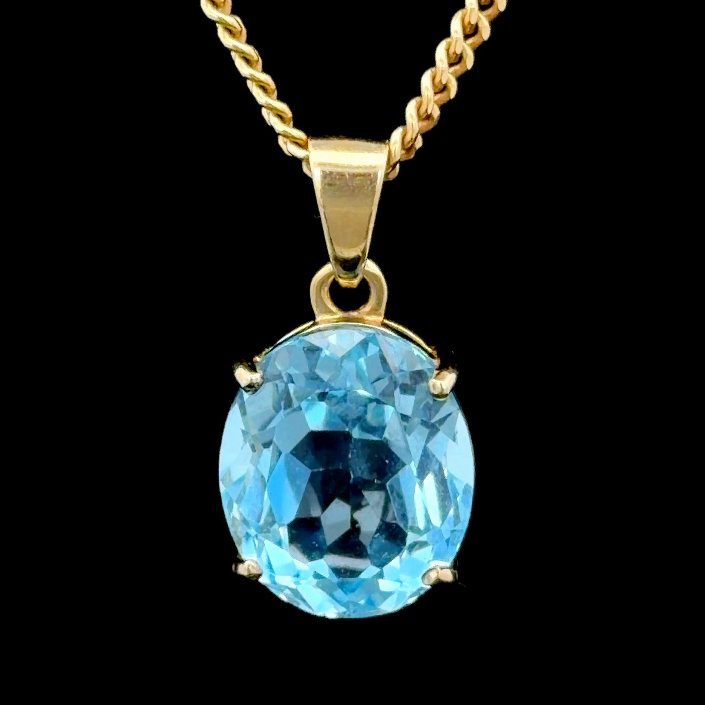 9k Yellow Gold Oval Blue Topaz Pendant