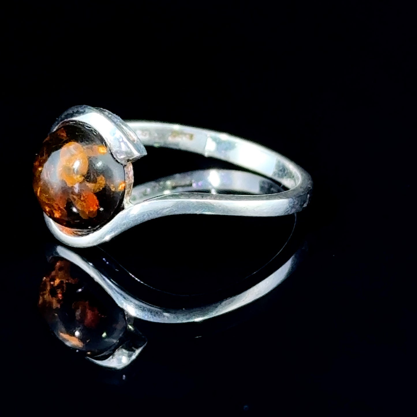 Delightful Silver & Cabouchon Amber Swirl Ring