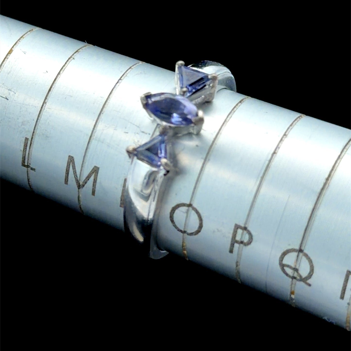 9k White Gold Marquise and Trillion Cut Tanzanite Trilogy Ring in White Gold