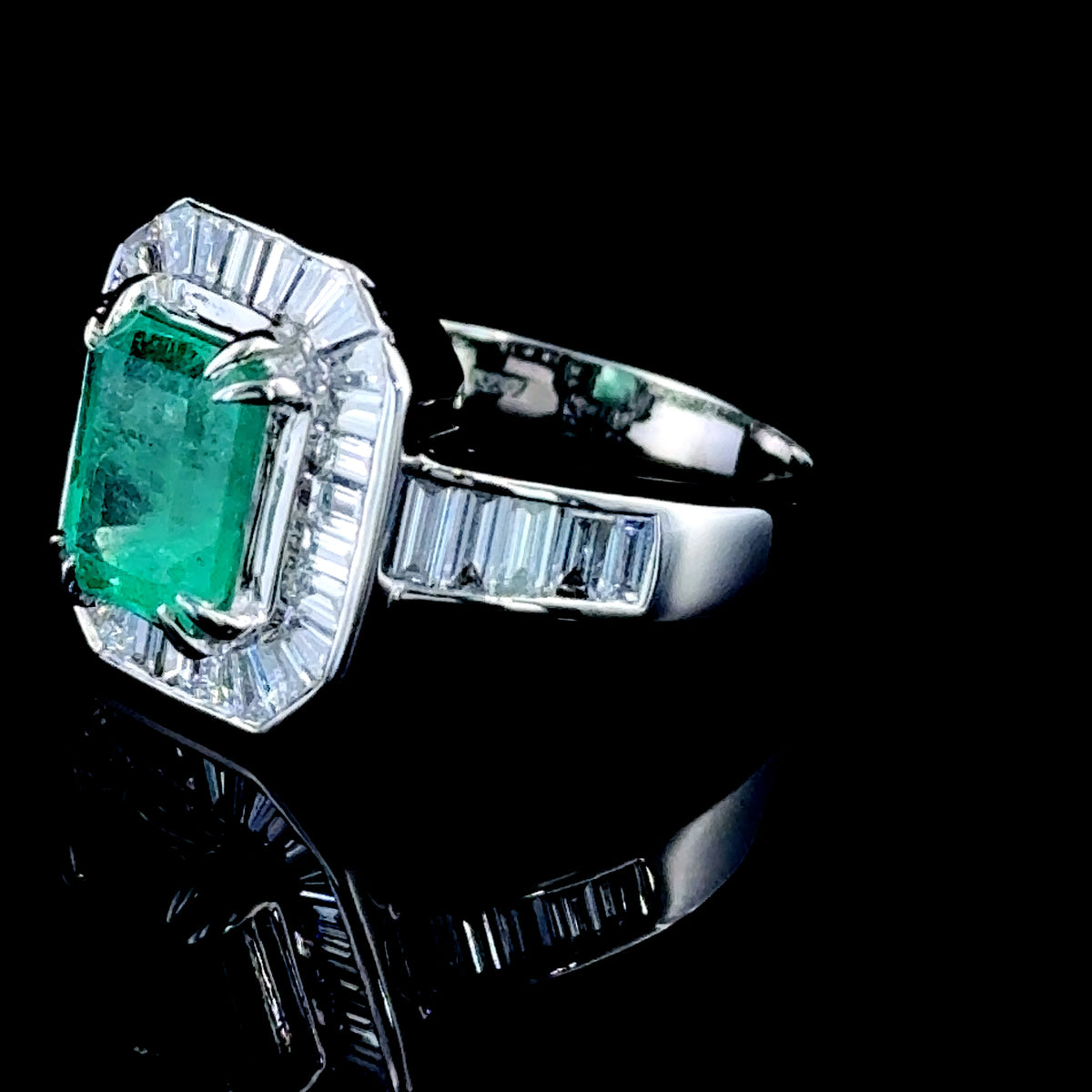 Platinum Emerald and Baguette Diamond Halo Ring With Diamonds to shoulders APPX: E-1.8CTS D-1CTS