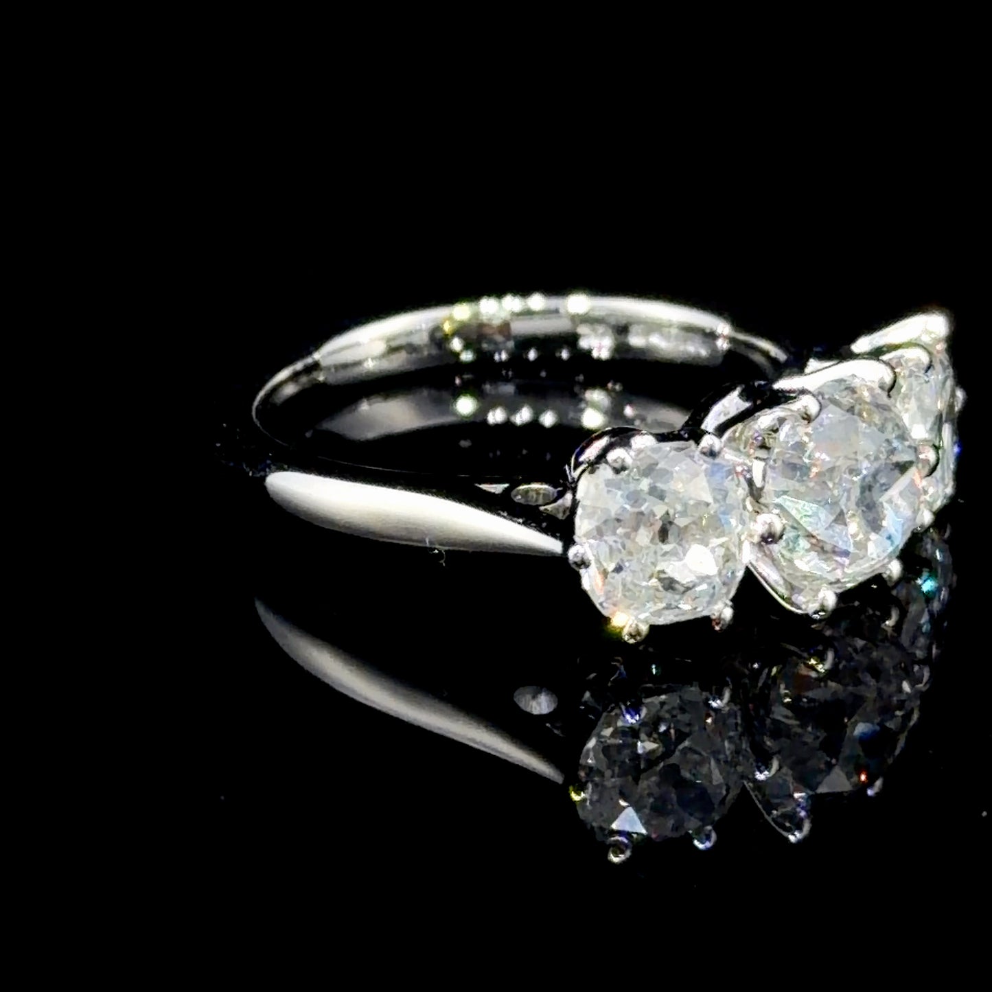 A Spectacular Platinum & Old Cut Diamond Trilogy Ring of 2.7 Cts