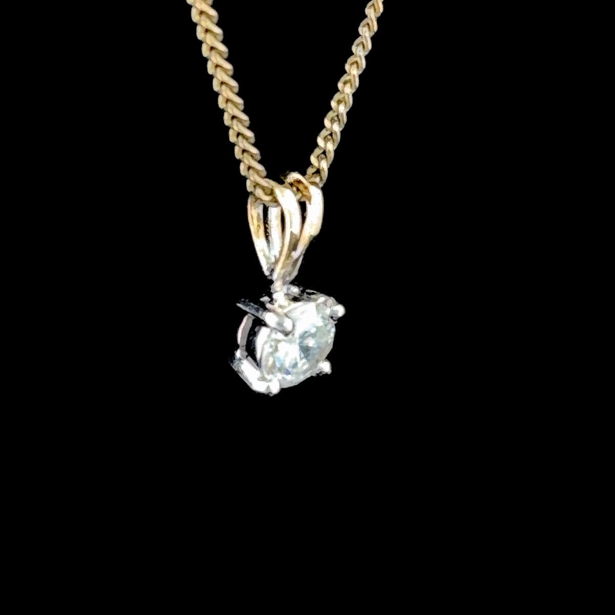 A Lovely 18k Diamond Solitaire Pendant of 0.5 Cts Part Of The Ronald Charles Collection