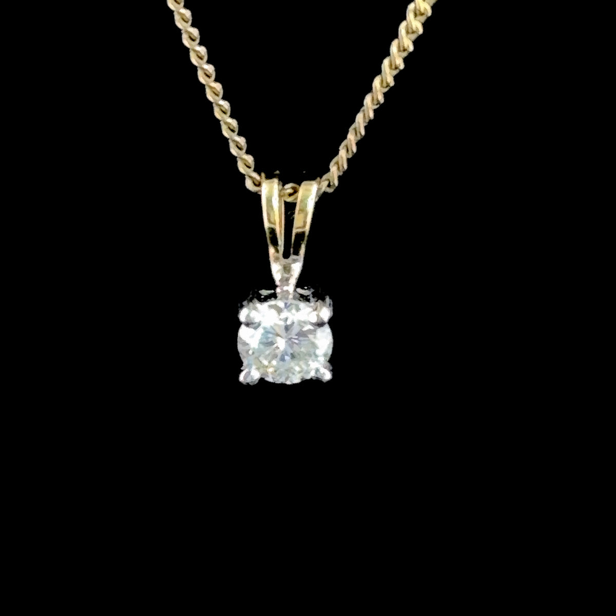 A Lovely 18k Diamond Solitaire Pendant of 0.5 Cts Part Of The Ronald Charles Collection