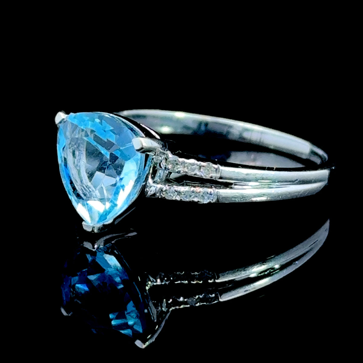 9K White Gold Trilliant Blue Topaz Ring with Diamonds to Shoulders