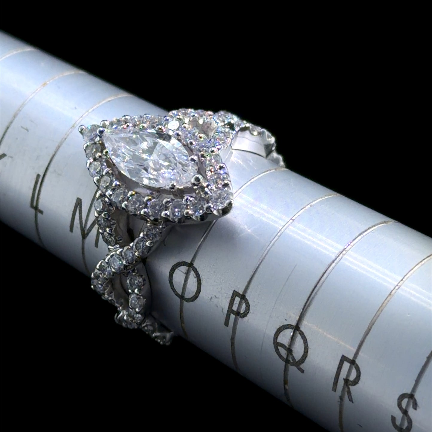 18k White Gold Marquise Diamond Halo Ring With Twisted Shank. 1.01 Cts D VS1