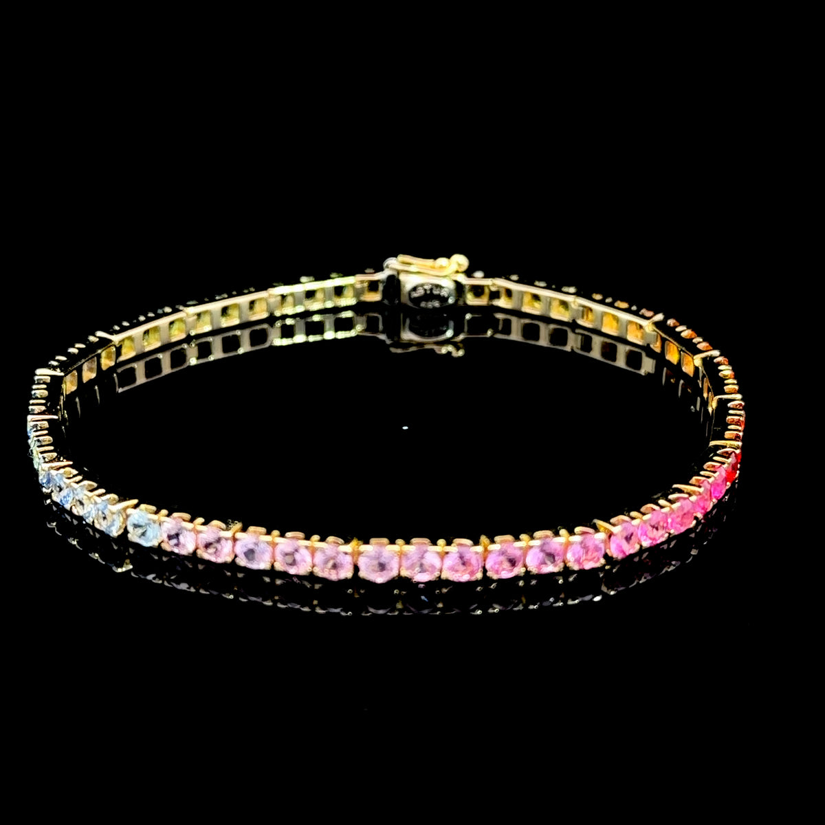 A Lovely 14k Yellow Gold Rainbow Sapphire Tennis Bracelet Having The full Range Of Colours & 7.4Cts 7.5 Inches Long