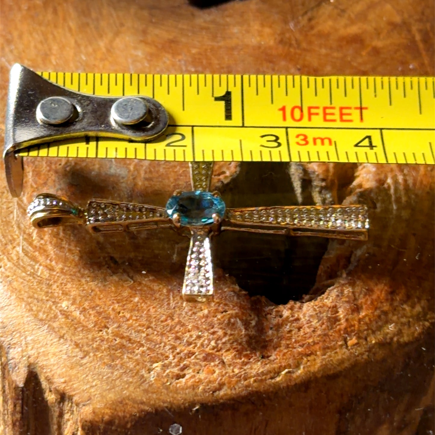 9k Oval Blue Topaz and Pave Diamond Yellow Gold Cross Pendant