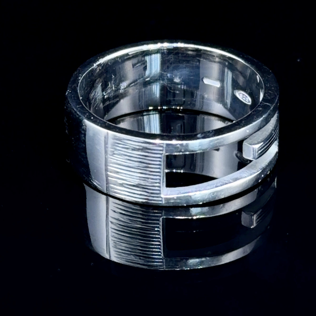 A Sterling Silver G Ring Featuring A Ribbed Finish By Gucci