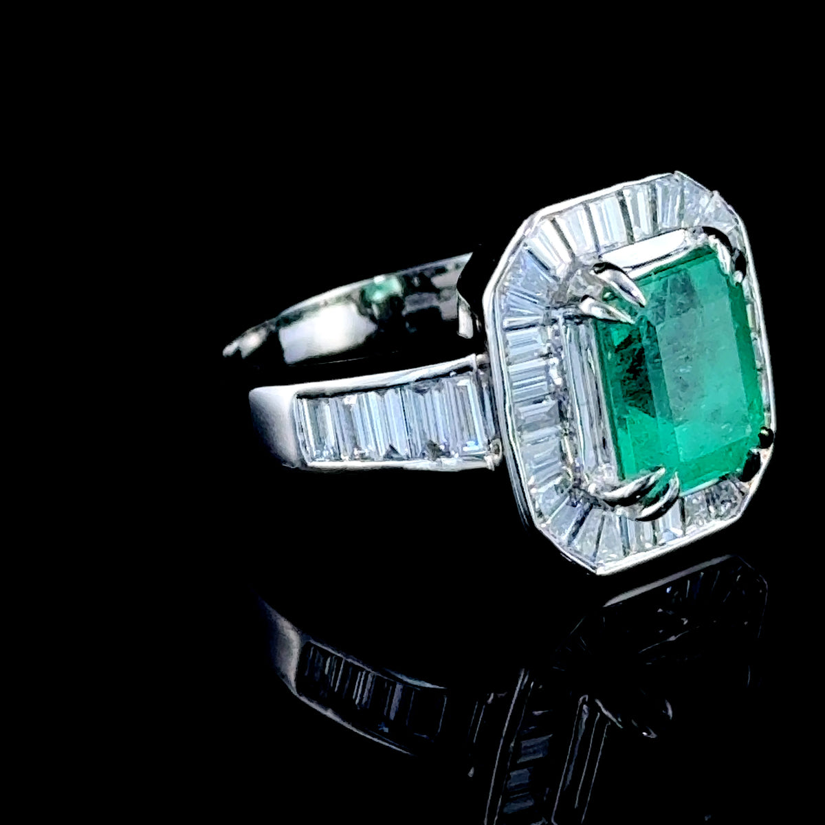 Platinum Emerald and Baguette Diamond Halo Ring With Diamonds to shoulders APPX: E-1.8CTS D-1CTS