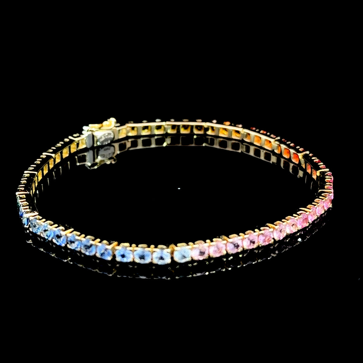 A Lovely 14k Yellow Gold Rainbow Sapphire Tennis Bracelet Having The full Range Of Colours & 7.4Cts 7.5 Inches Long