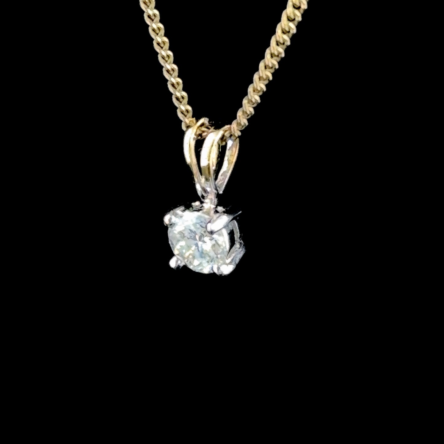 A Lovely 18k Diamond Solitaire Pendant of 0.5 Cts Part Of The Ronald Charles Collection