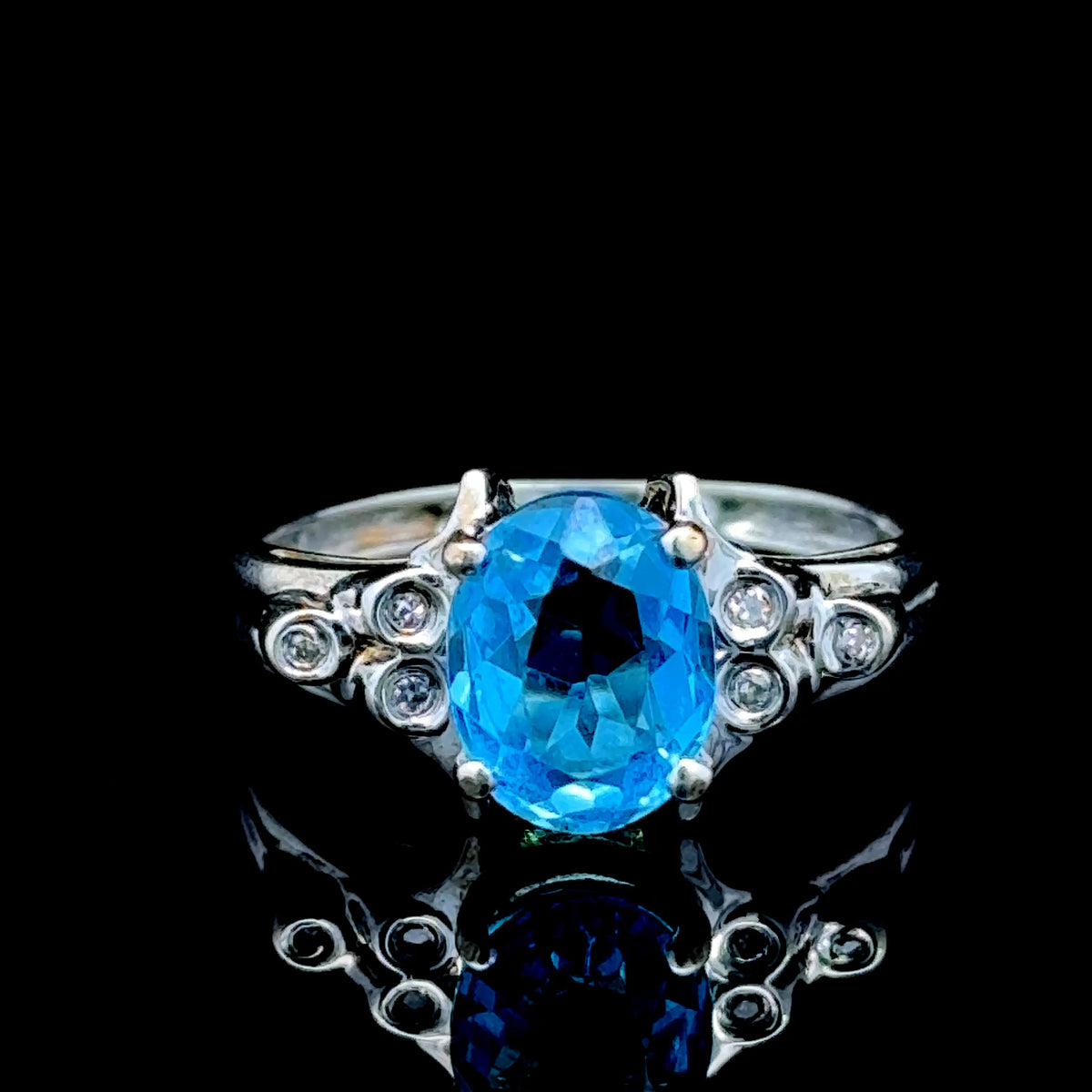 9K White Gold Blue Topaz & Diamond Ring