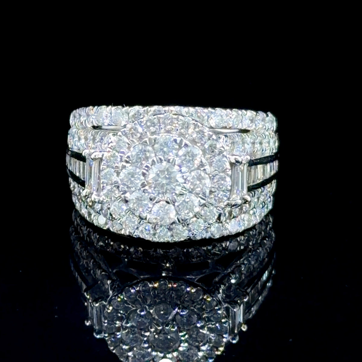 A Stunning Diamond Daisy Cluster Ring Featuring Round Brilliant And Baguette Cut Diamonds Appx 2.0 Cts Si1-2  J-K Colour