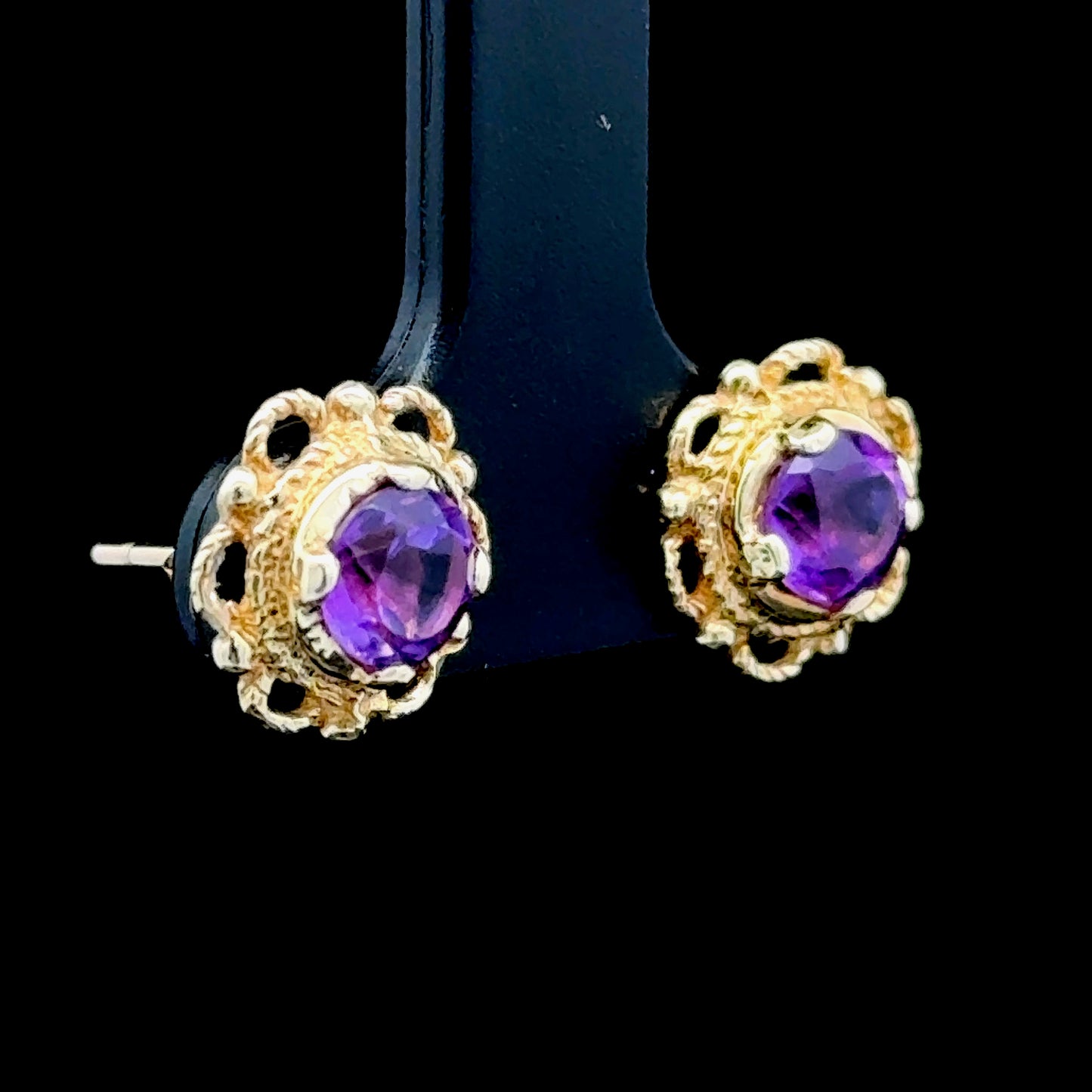 9k Yellow Gold Amethyst Studs in a Fancy Mount