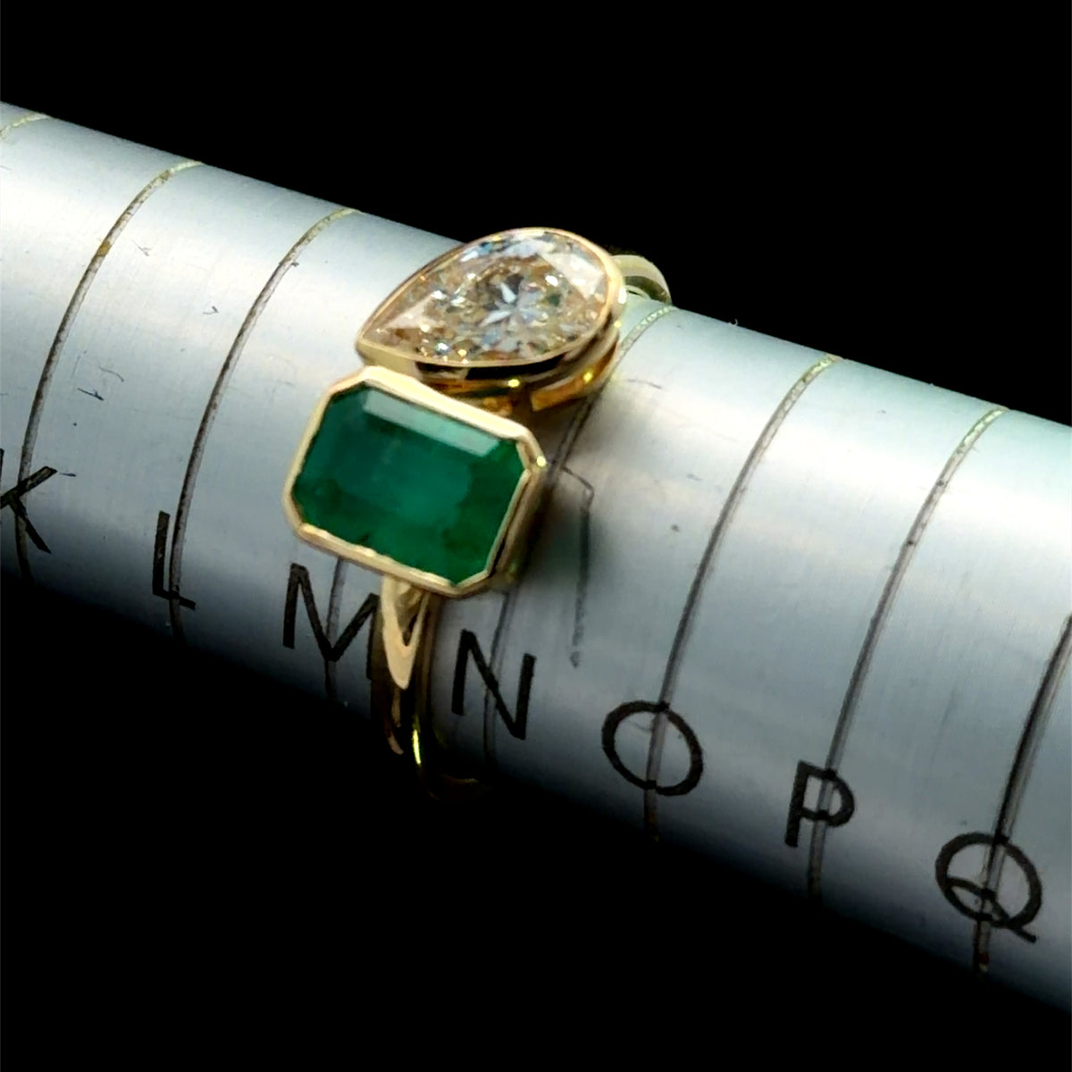 A Wonderful Moi Et Toi Pear Diamond of 0.9Cts & An Emerald Cut Emerald of 1.1 Ct Total 2 Cts