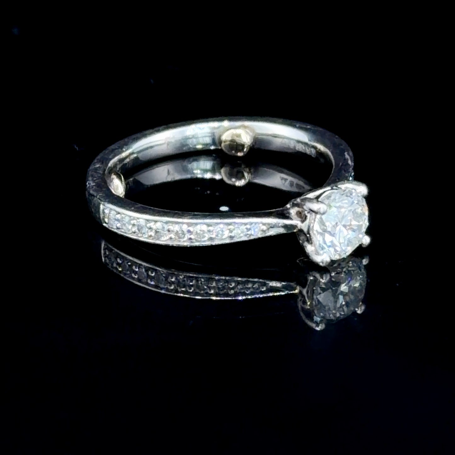 Pretty Platinum Solitaire Diamond Ring Having A 0.5 Ct Centre Appx 0.7 Cts Total