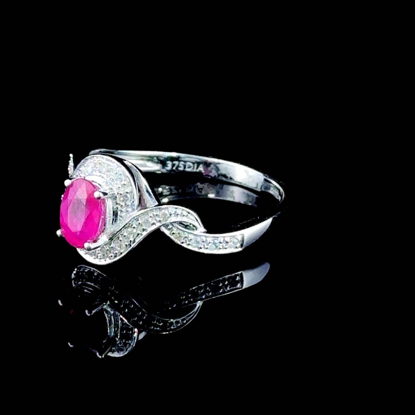 9K White Gold Ruby & Diamond Twisted Ring