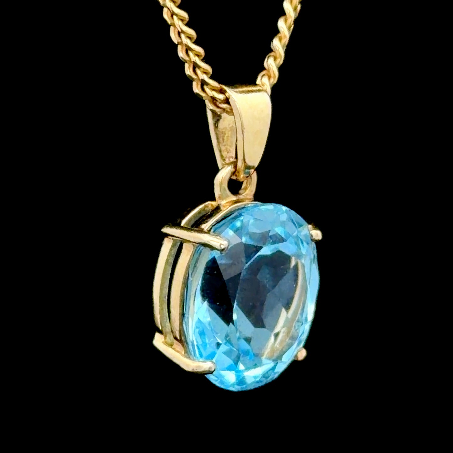 9k Yellow Gold Oval Blue Topaz Pendant